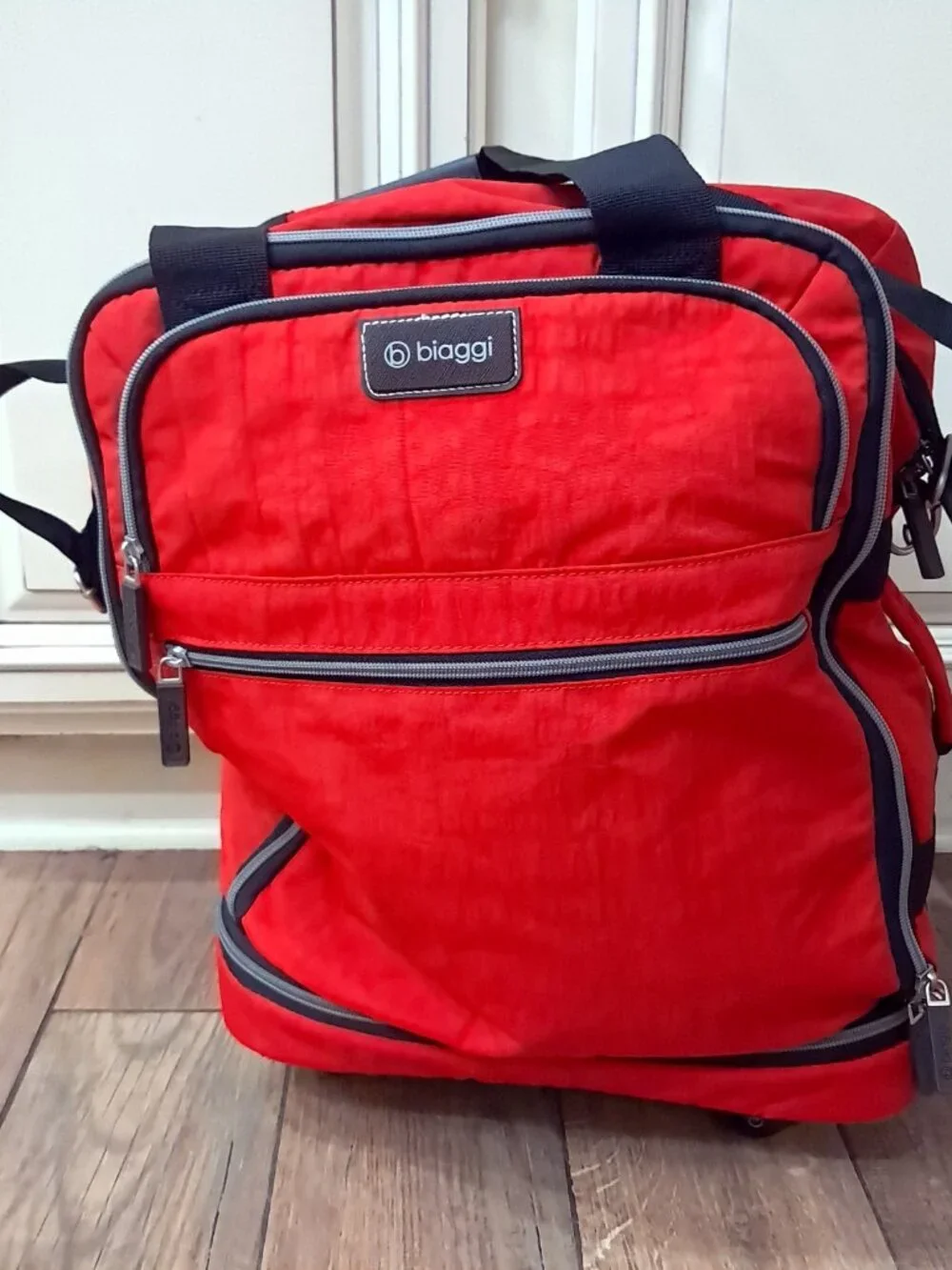 Biaggi Rolling Red Spinner Carry-On Duffle bag luggage foldable Microfold Zipsak